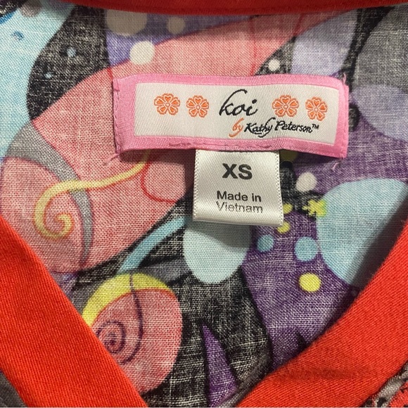 Koi Red Multicolor Abstract V Neck Tie Waist Kathryn Scrub Top - Picture 5 of 6